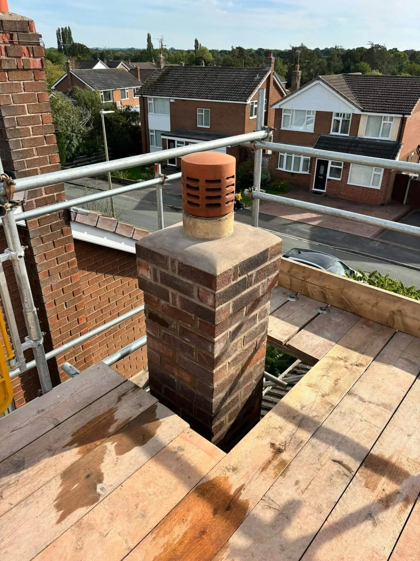 Brick chimney repairs with a ventilated terminal