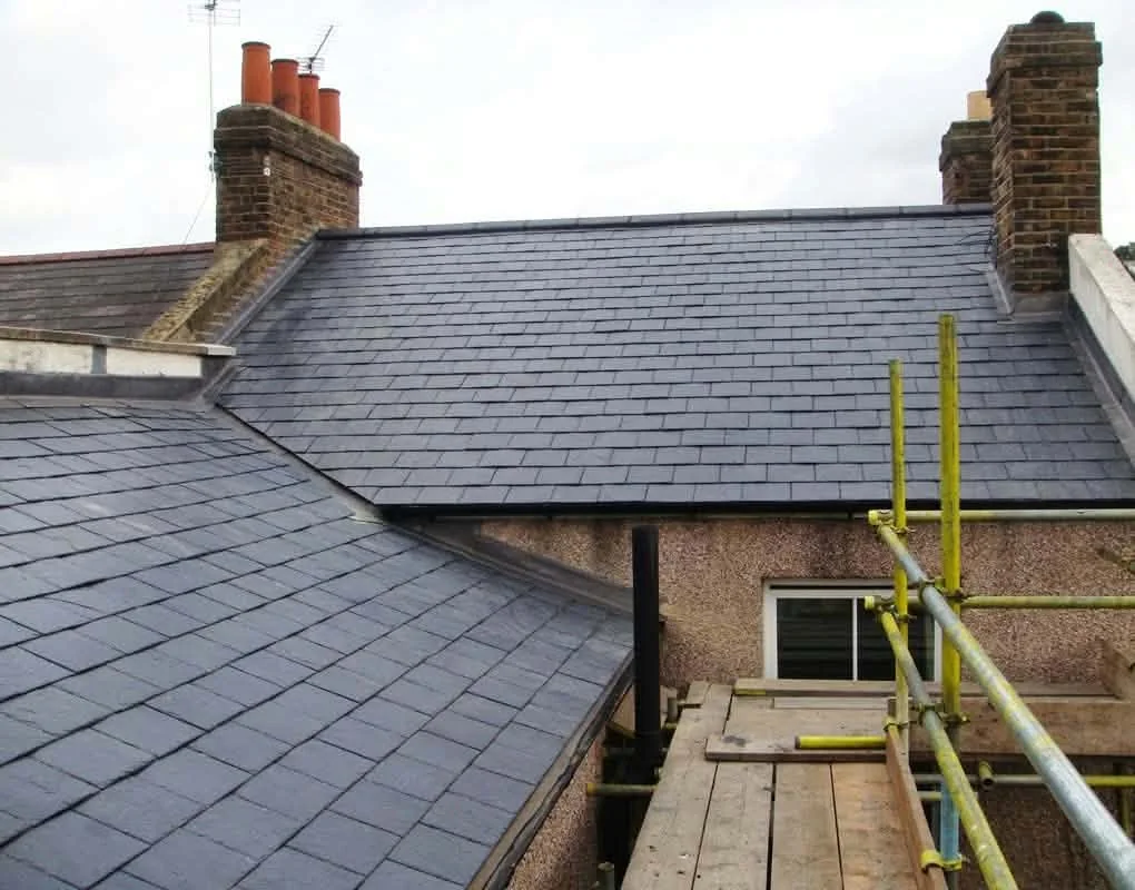 Completed pitched slate roofing from scaffolding