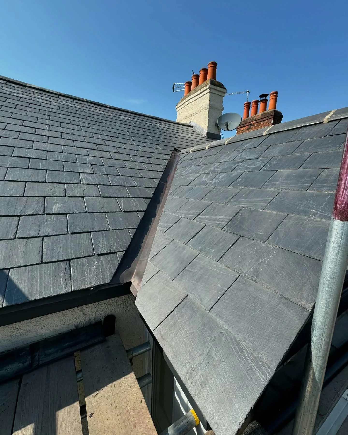 Completed slate roof with carefully finished valley